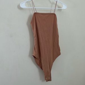 Like new peach tube top body suit, only worn once